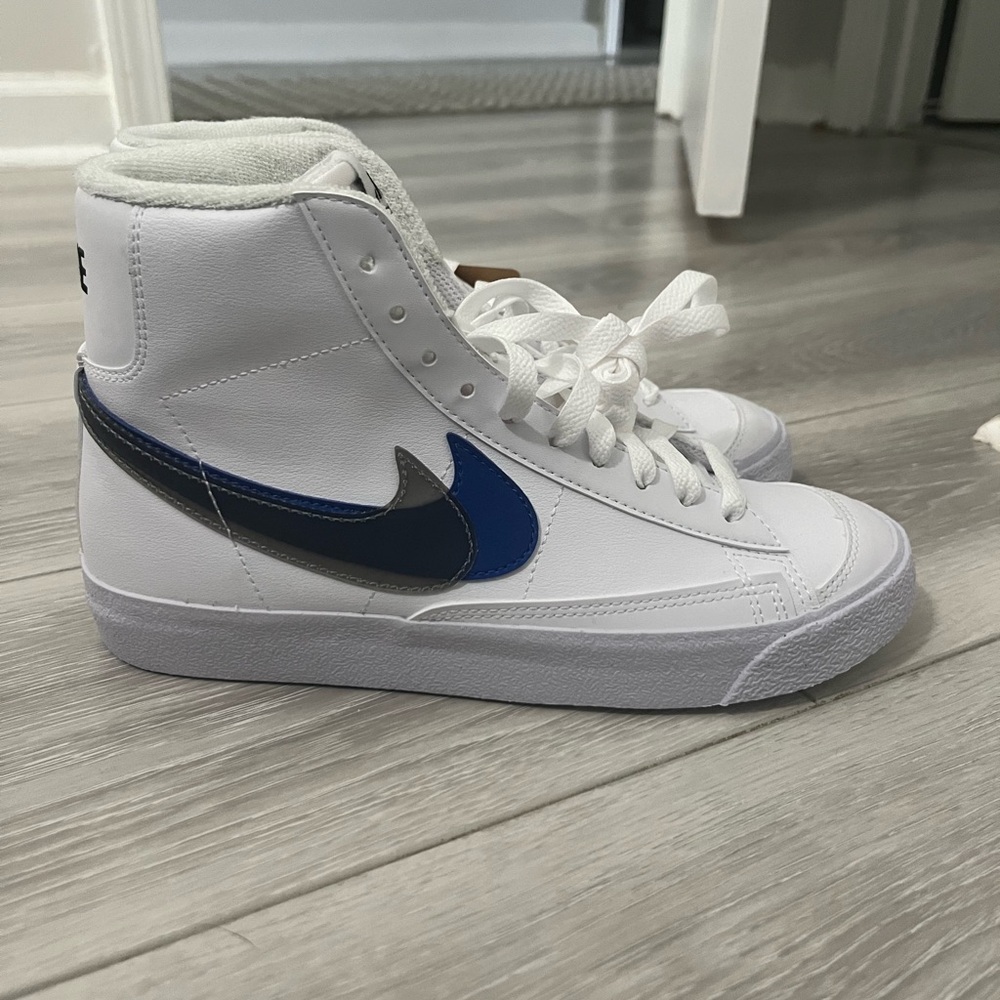 New with Tags Nike Blazer Mid White, Black-Hyper Royal. Women’s size 7/Kids 5.5Y
